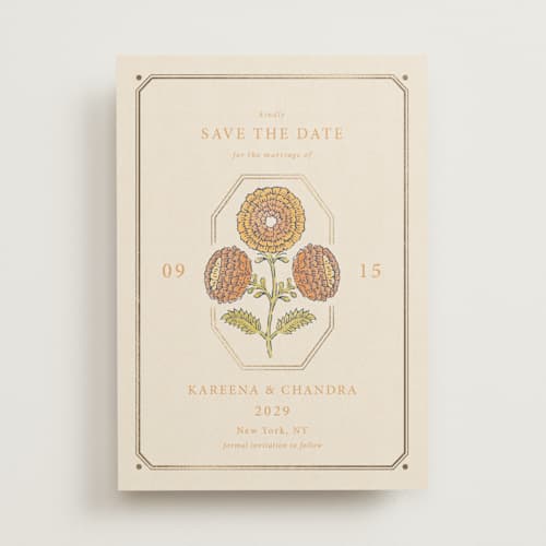 This is a ochre foil stamped save the date cards with foil pressed by Hannah Bowman called marigold printing on signature in standard