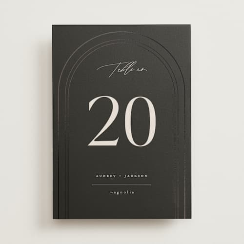 This is a truffle table numbers with foil pressed by Vera Lim called the arc printing on doublethick in standard