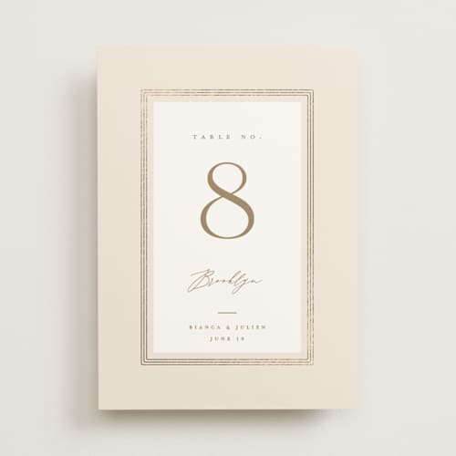This is a latte table numbers with foil pressed by Kristie Kern called soleil printing on doublethick in standard