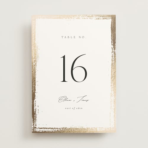 This is a silk table numbers with foil pressed by Kelly Schmidt called brushed edge printing on doublethick in standard