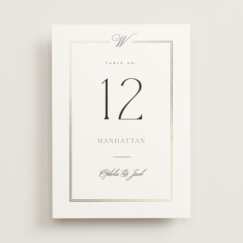 This is a pearl table numbers with foil pressed by Leah Bisch called elegant type printing on doublethick in standard