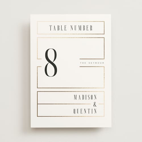 This is a lily table numbers with foil pressed by Heather Schertzer called documentary printing on doublethick in standard