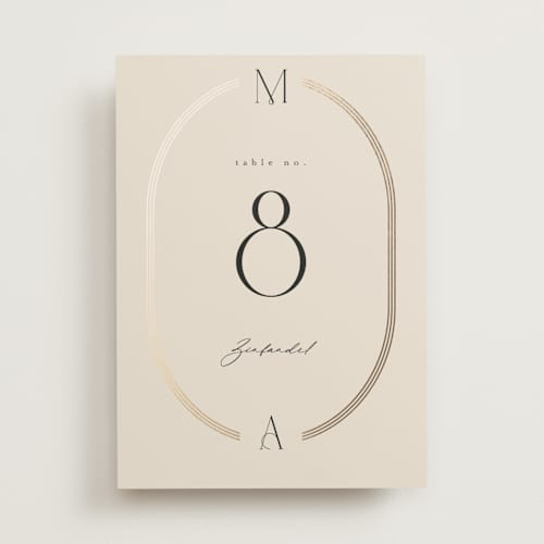 This is a latte table numbers with foil pressed by Kristie Kern called misha printing on doublethick in standard
