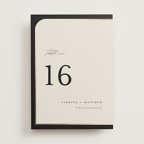 This is a black tie table numbers with foil pressed by Carolyn Nicks called tuxedo printing on doublethick in standard