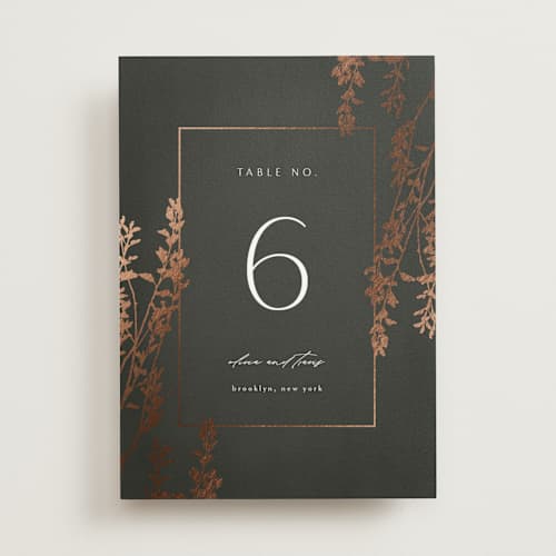 This is a ivy table numbers with foil pressed by Kelly Schmidt called quince printing on doublethick in standard