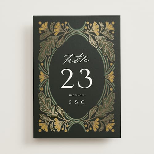 This is a buttercup table numbers with foil pressed by Jen Owens called embellished printing on doublethick in standard