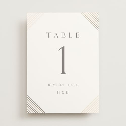 This is a slate table numbers with foil pressed by Vanessa Doyle called song of solomon printing on doublethick in standard