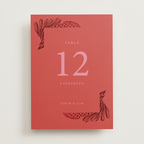 This is a ruby table numbers with foil pressed by Ghia Designs called fiery printing on doublethick in standard