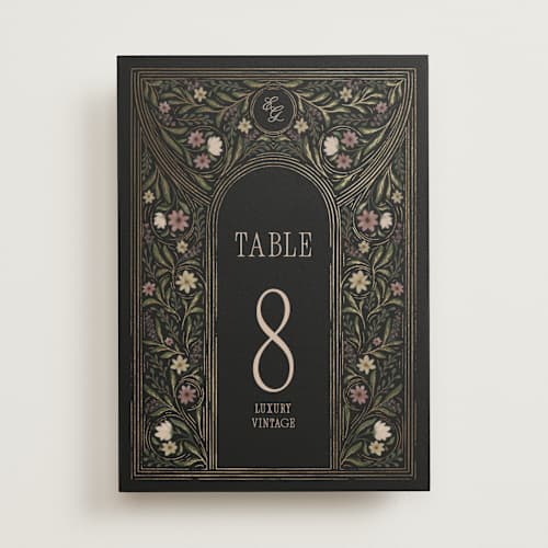 This is a noir table numbers with foil pressed by Randi Cirelli called emilie printing on doublethick in standard