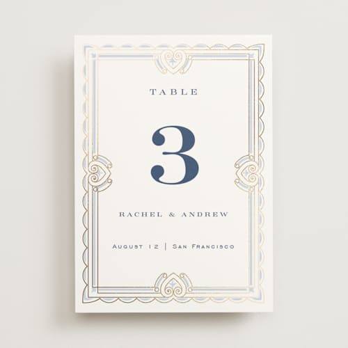 This is a dusty blue table numbers with foil pressed by Janean Hinger called aurelia printing on doublethick in standard