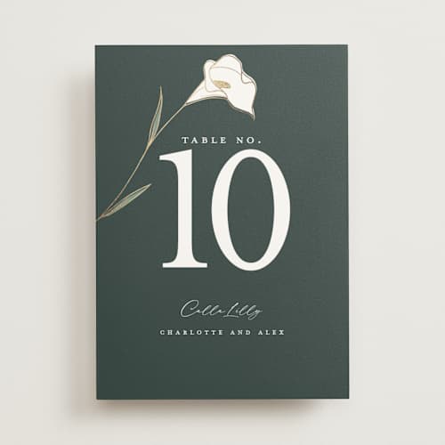 This is a forest table numbers with foil pressed by Stacey Meacham called elegant lillies printing on doublethick in standard