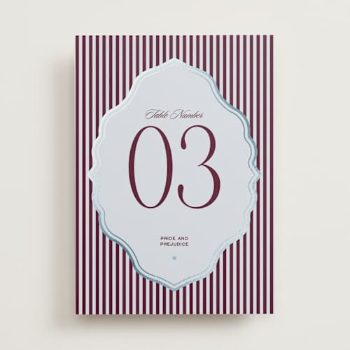 This is a celestial table numbers with foil pressed by Jenna Holcomb called modern vintage printing on doublethick in standard