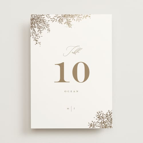 This is a porcelain table numbers with foil pressed by Leah Bisch called reflection printing on doublethick in standard