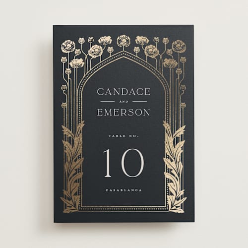 This is a navy table numbers with foil pressed by Ana de Sousa called nouveau flowers printing on doublethick in standard