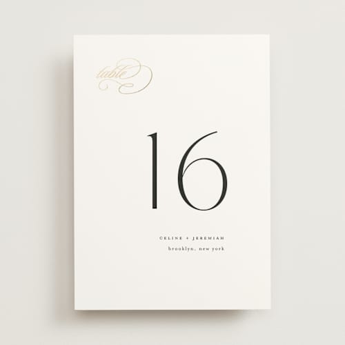This is a silk table numbers with foil pressed by Kelly Schmidt called left align printing on doublethick in standard