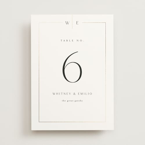 This is a silk table numbers with foil pressed by Kelly Schmidt called arcadia printing on doublethick in standard