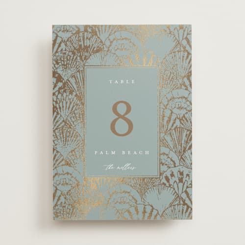 This is a ocean table numbers with foil pressed by Maria Alou called by the seashore printing on doublethick in standard