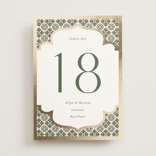 This is a evergreen table numbers with foil pressed by Oma N. Ramkhelawan called kareem printing on doublethick in standard