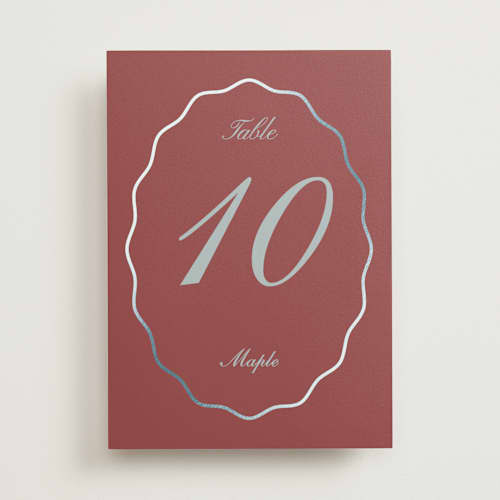 This is a burgundy table numbers with foil pressed by Baumbirdy called scallop frame printing on doublethick in standard