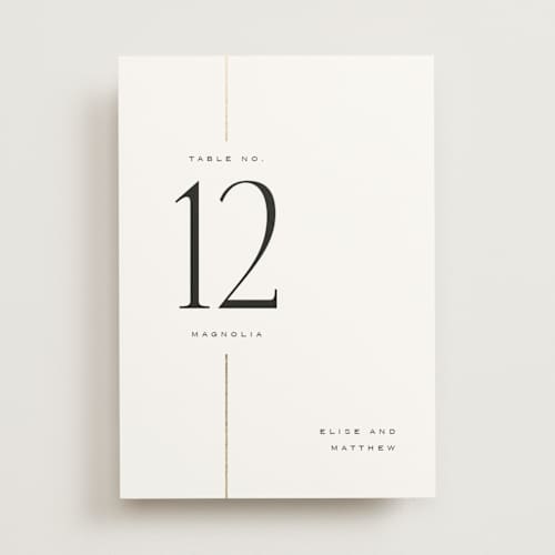 This is a silk table numbers with foil pressed by Laura Hankins called linear printing on doublethick in standard