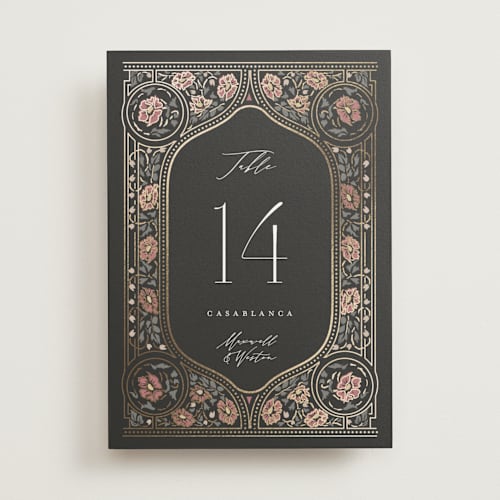 This is a ebony table numbers with foil pressed by Ana de Sousa called timeless nature printing on doublethick in standard