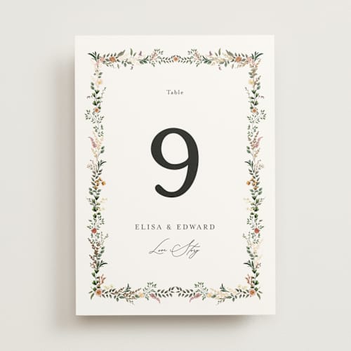 This is a blush table numbers with foil pressed by Susan Moyal called blooming vine printing on doublethick in standard