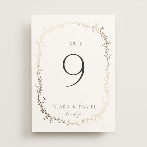 This is a alabaster table numbers with foil pressed by Susan Moyal called delicate vine printing on doublethick in standard