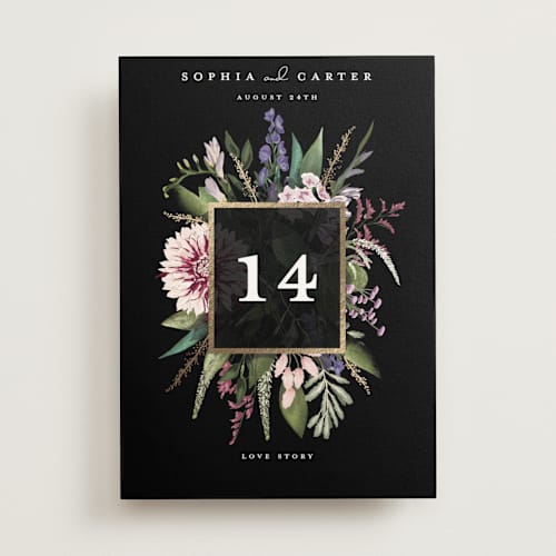 This is a midnight table numbers with foil pressed by Susan Moyal called bold bouquet printing on doublethick in standard