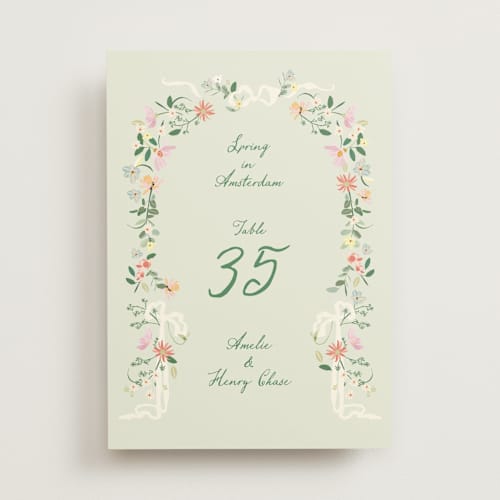 This is a spring table numbers with standard by Phrosné Barwood called spring draped garland printing on doublethick in standard