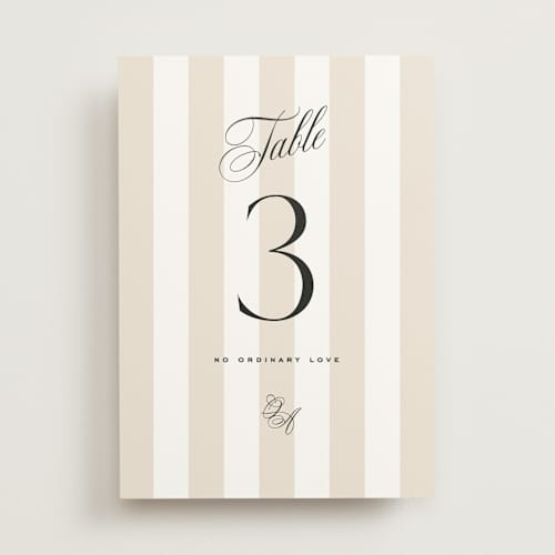 This is a almond table numbers with standard by Eric Clegg called modern romance printing on doublethick in standard