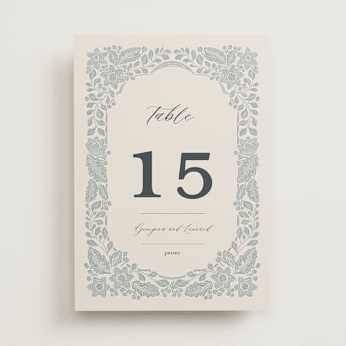 This is a dusty blue table numbers with standard by Jen Owens called embroidered printing on doublethick in standard