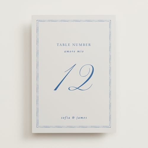 This is a blue mist table numbers with standard by Design Lotus called amalfi blue printing on doublethick in standard