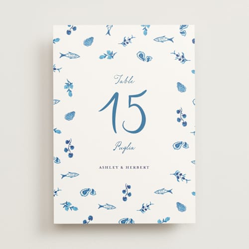 This is a cerulean table numbers with standard by Tamara Hilje called positano printing on doublethick in standard