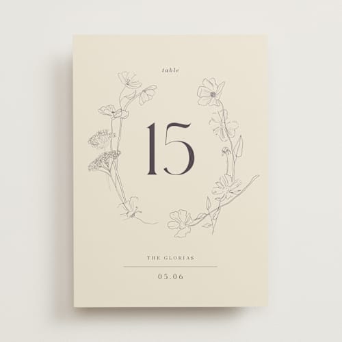 This is a ivory table numbers with standard by Baumbirdy called floral stamp printing on doublethick in standard