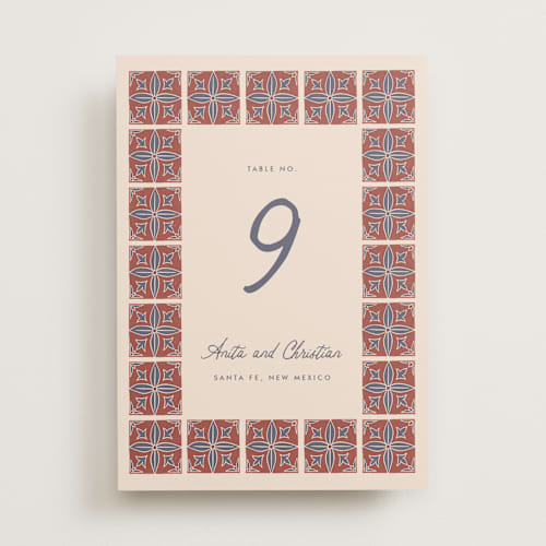 This is a terracotta table numbers with standard by Katharine Watson called block print tile printing on doublethick in standard
