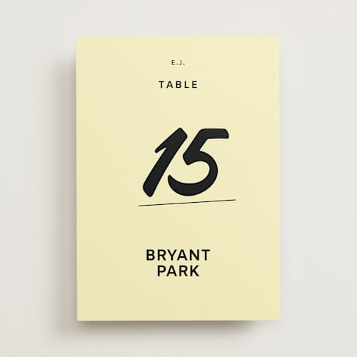 This is a butter table numbers with standard by Studio Suku called courthouse printing on doublethick in standard
