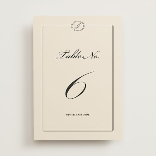 This is a cream table numbers with standard by Ryan Nicole called uptown formal printing on doublethick in standard