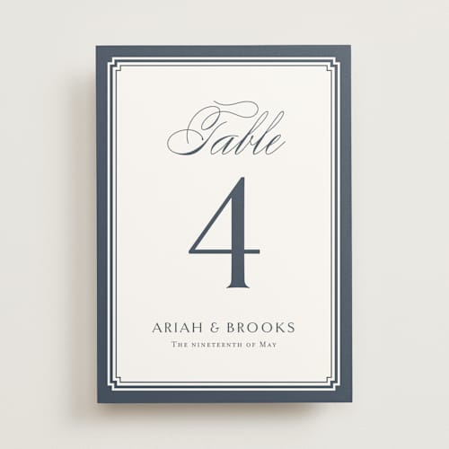 This is a french blue table numbers with standard by Jennifer Postorino called ariah printing on doublethick in standard
