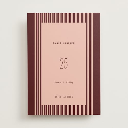 This is a burgundy table numbers with standard by Nazia Hyder called museum printing on doublethick in standard