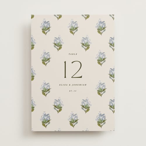 This is a almond table numbers with standard by Olivia Kanaley Inman called blockprint printing on doublethick in standard