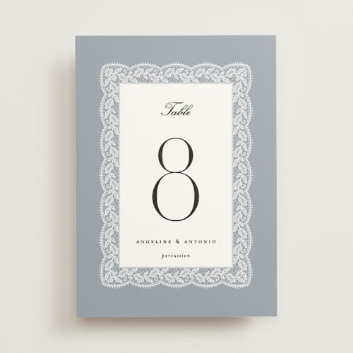 This is a dusty blue table numbers with standard by Erica Krystek called chantilly printing on doublethick in standard
