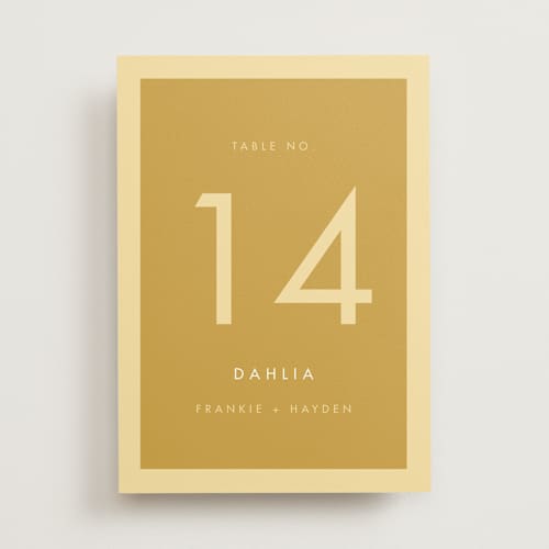 This is a buttercup table numbers with standard by Snow and Ivy called colorfield printing on doublethick in standard