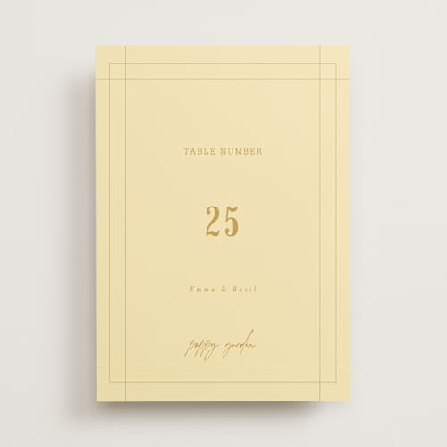 This is a butter table numbers with standard by Nazia Hyder called vintage label printing on doublethick in standard