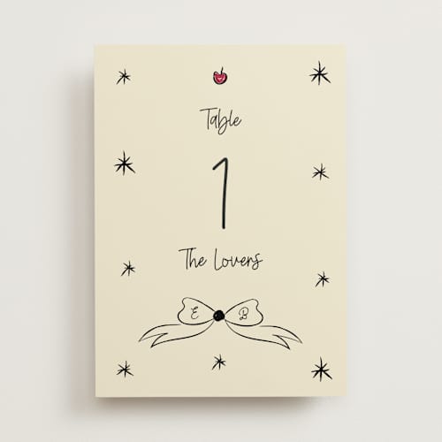 This is a champagne table numbers with standard by Helena Vitto called modern love printing on doublethick in standard