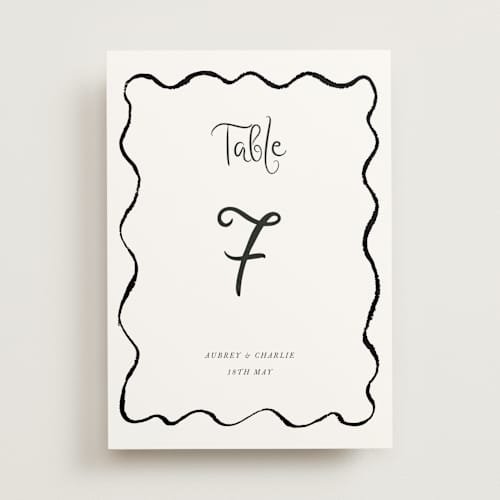 This is a tuxedo table numbers with standard by Cass Loh called quirky fun printing on doublethick in standard