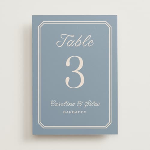This is a french blue table numbers with standard by Carolyn MacLaren called bevel monogram printing on doublethick in standard