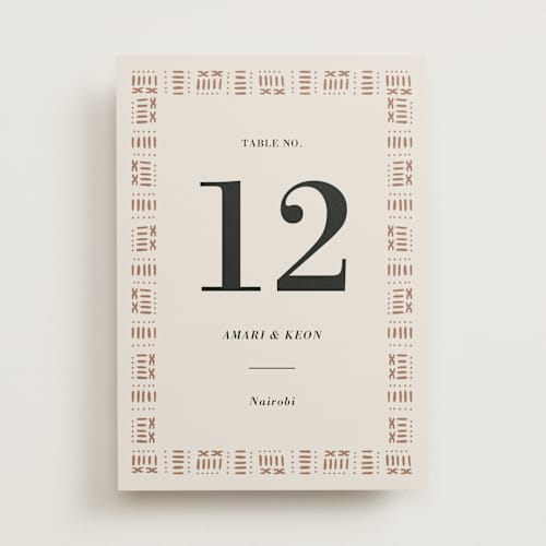 This is a ivory table numbers with standard by Oma N. Ramkhelawan called amari printing on doublethick in standard