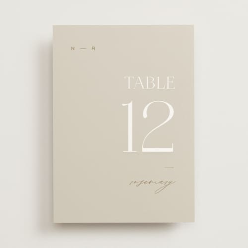 This is a natural table numbers with standard by Leah Bisch called oval printing on doublethick in standard