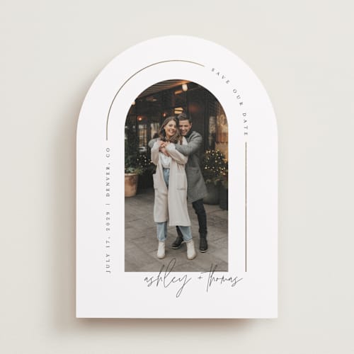 This is a silk foil stamped save the date cards with foil pressed by Kelly Schmidt called arch printing on recycled smooth signature in standard