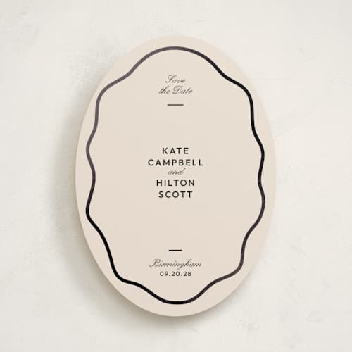 This is a ink foil stamped save the date cards with foil pressed by Megan Davis called croquet printing on signature in standard